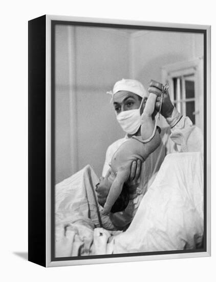 Country Doctor Ernest Ceriani Delivering a Baby-W^ Eugene Smith-Framed Premier Image Canvas