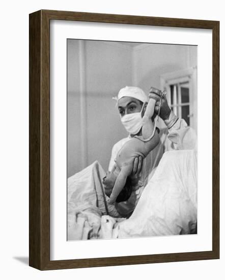 Country Doctor Ernest Ceriani Delivering a Baby-W^ Eugene Smith-Framed Photographic Print