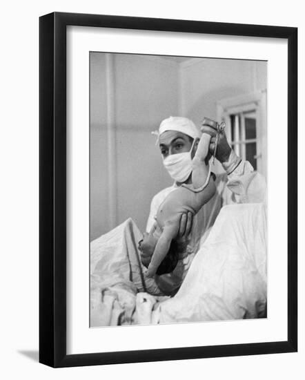 Country Doctor Ernest Ceriani Delivering a Baby-W^ Eugene Smith-Framed Photographic Print