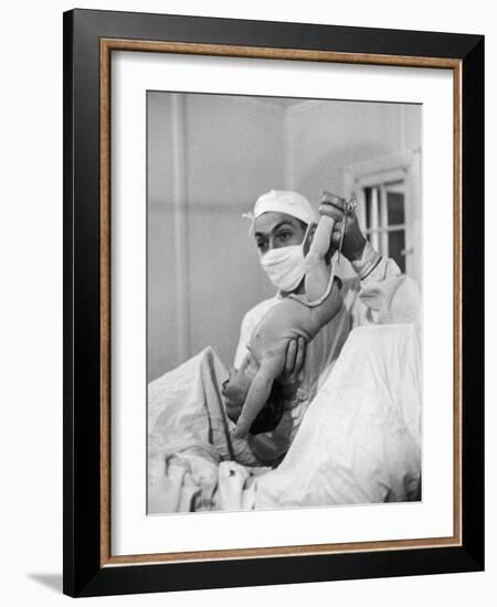 Country Doctor Ernest Ceriani Delivering a Baby-W^ Eugene Smith-Framed Photographic Print