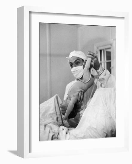 Country Doctor Ernest Ceriani Delivering a Baby-W^ Eugene Smith-Framed Photographic Print