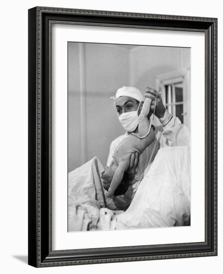 Country Doctor Ernest Ceriani Delivering a Baby-W^ Eugene Smith-Framed Photographic Print