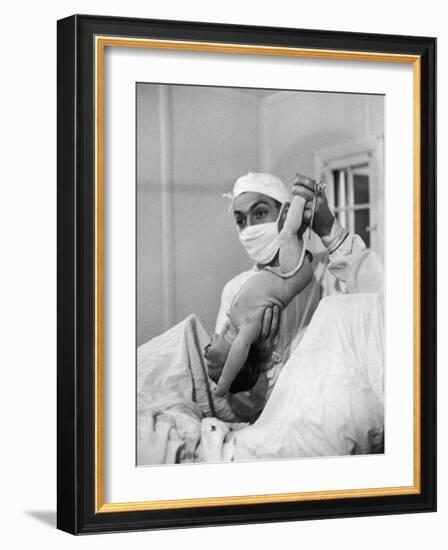 Country Doctor Ernest Ceriani Delivering a Baby-W^ Eugene Smith-Framed Photographic Print