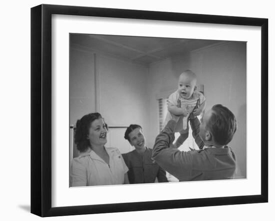 Country Doctor Ernest Ceriani Giving Checkup to 8 Month Old Infant Mike Huffaker-W^ Eugene Smith-Framed Photographic Print