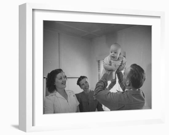 Country Doctor Ernest Ceriani Giving Checkup to 8 Month Old Infant Mike Huffaker-W^ Eugene Smith-Framed Photographic Print