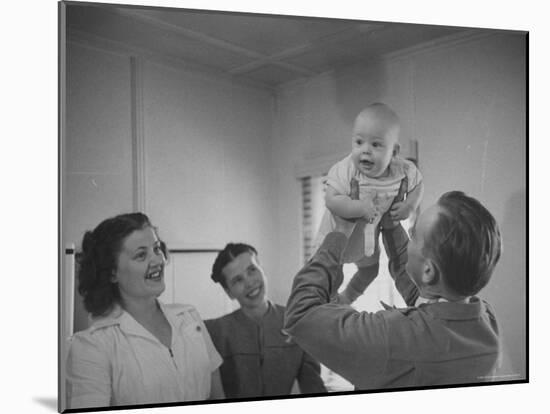 Country Doctor Ernest Ceriani Giving Checkup to 8 Month Old Infant Mike Huffaker-W^ Eugene Smith-Mounted Photographic Print