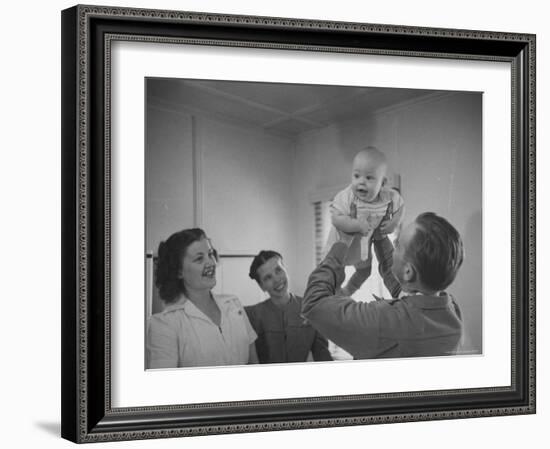 Country Doctor Ernest Ceriani Giving Checkup to 8 Month Old Infant Mike Huffaker-W^ Eugene Smith-Framed Photographic Print