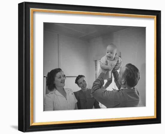 Country Doctor Ernest Ceriani Giving Checkup to 8 Month Old Infant Mike Huffaker-W^ Eugene Smith-Framed Photographic Print