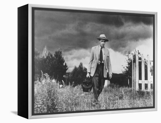 Country Doctor Ernest Ceriani Making House Call on Foot in Small Town-W^ Eugene Smith-Framed Premier Image Canvas