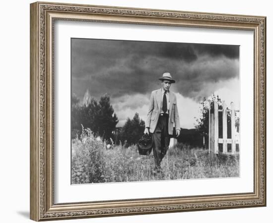 Country Doctor Ernest Ceriani Making House Call on Foot in Small Town-W^ Eugene Smith-Framed Photographic Print