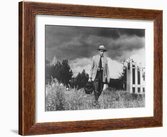 Country Doctor Ernest Ceriani Making House Call on Foot in Small Town-W^ Eugene Smith-Framed Photographic Print