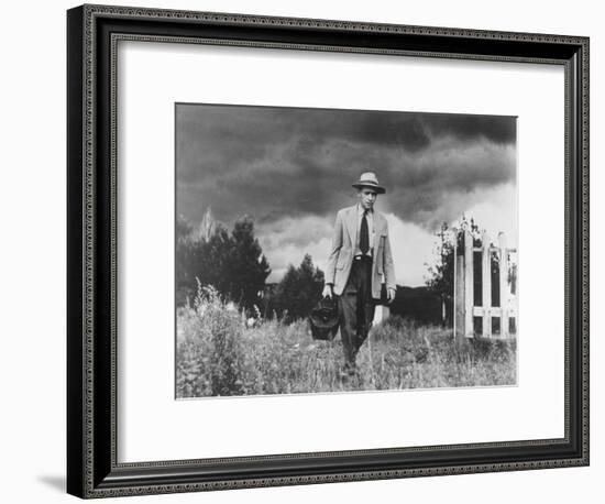 Country Doctor Ernest Ceriani Making House Call on Foot in Small Town-W^ Eugene Smith-Framed Photographic Print