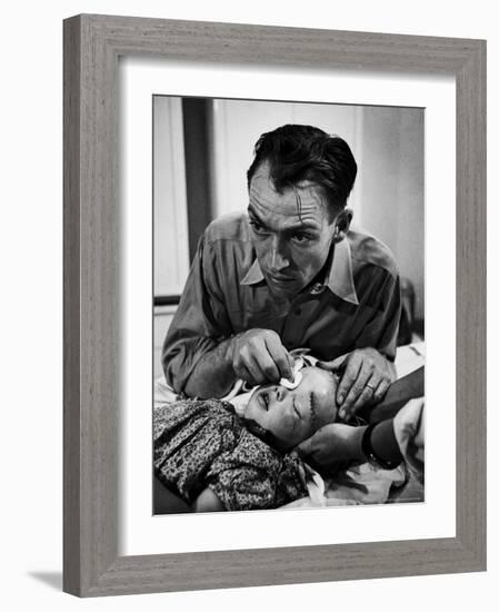 Country Dr. Ernest Ceriani Aftter girl gets stiches from being kicked in head by a Horse-W^ Eugene Smith-Framed Photographic Print