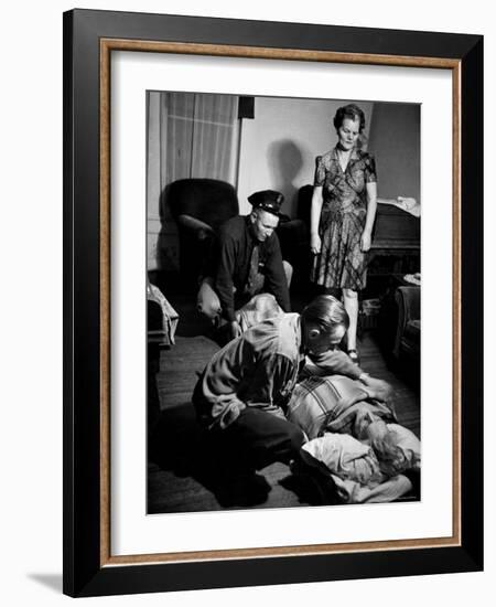 Country Dr. Ernest Ceriani Tucking Blanket around 82-Year-Old Man Dying of a Heart Attack in Parlor-W^ Eugene Smith-Framed Photographic Print