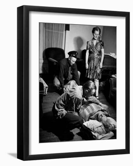 Country Dr. Ernest Ceriani Tucking Blanket around 82-Year-Old Man Dying of a Heart Attack in Parlor-W^ Eugene Smith-Framed Photographic Print