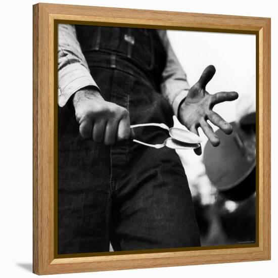 Country Music: Close Up of Spoons Being Played by Man in Overalls-Eric Schaal-Framed Premier Image Canvas