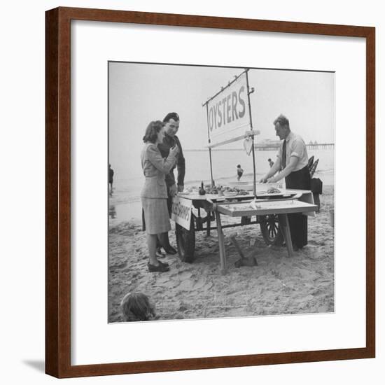 Couple Buying Seafood at Blackpool Beach-Ian Smith-Framed Premium Photographic Print