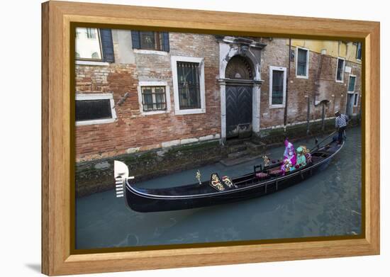 Couple Dressed for Gondola Ride Venice at Carnival Time, Italy-Darrell Gulin-Framed Premier Image Canvas