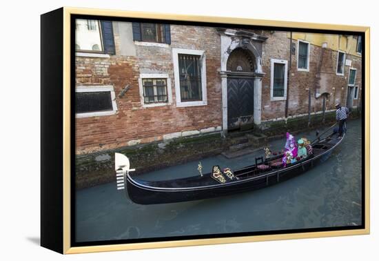 Couple Dressed for Gondola Ride Venice at Carnival Time, Italy-Darrell Gulin-Framed Premier Image Canvas