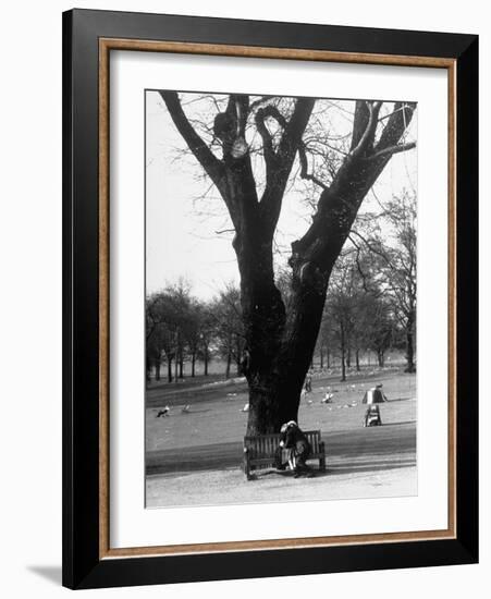 Couple Embracing in a Passionate Moment on the Bench in Hyde Park-Cornell Capa-Framed Photographic Print