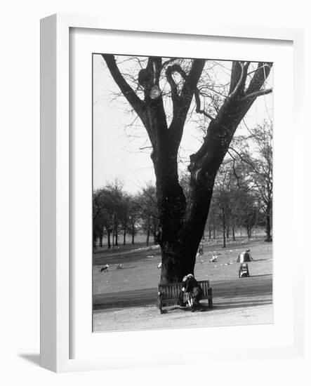 Couple Embracing in a Passionate Moment on the Bench in Hyde Park-Cornell Capa-Framed Photographic Print