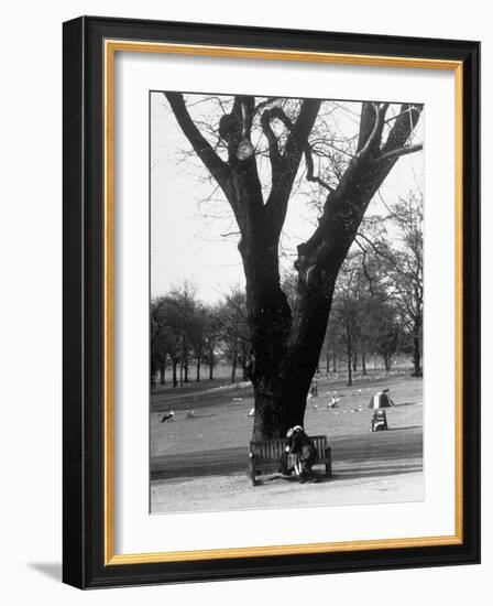 Couple Embracing in a Passionate Moment on the Bench in Hyde Park-Cornell Capa-Framed Photographic Print
