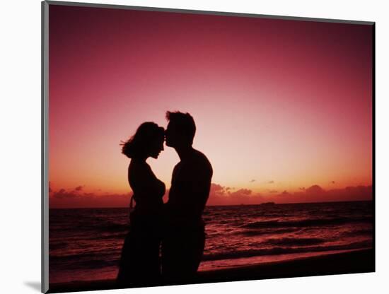 Couple Enjoying a Romantic Sunset on the Beach-Bill Bachmann-Mounted Photographic Print