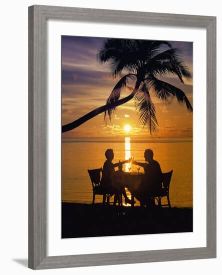 Couple Having Dinner at the Beach, Toasting Glasses, Maldives, Indian Ocean, Asia-Sakis Papadopoulos-Framed Photographic Print