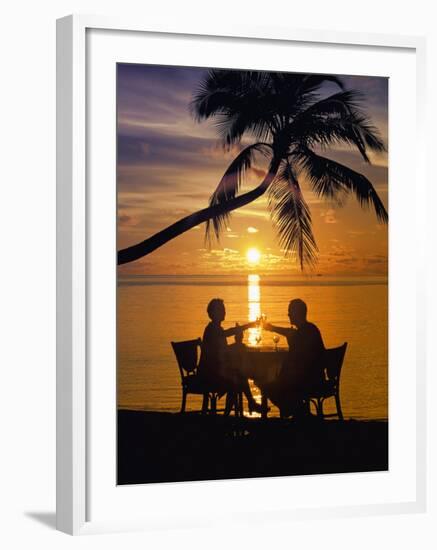 Couple Having Dinner at the Beach, Toasting Glasses, Maldives, Indian Ocean, Asia-Sakis Papadopoulos-Framed Photographic Print