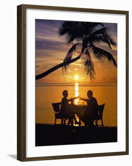 Couple Having Dinner at the Beach, Toasting Glasses, Maldives, Indian Ocean, Asia-Sakis Papadopoulos-Framed Photographic Print