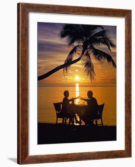 Couple Having Dinner at the Beach, Toasting Glasses, Maldives, Indian Ocean, Asia-Sakis Papadopoulos-Framed Photographic Print