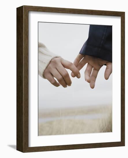 Couple Holding Hands-null-Framed Photographic Print