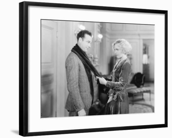 Couple in a Living Room Holding Each Other-null-Framed Photo