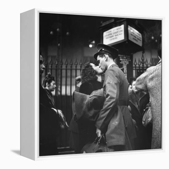 Couple in Penn Station Sharing Farewell Kiss Before He Ships Off to War During WWII-Alfred Eisenstaedt-Framed Premier Image Canvas