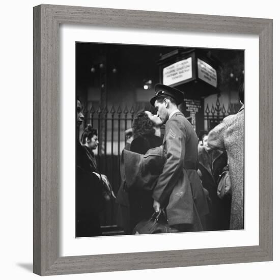 Couple in Penn Station Sharing Farewell Kiss Before He Ships Off to War During WWII-Alfred Eisenstaedt-Framed Photographic Print