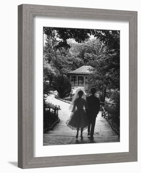 Couple Just Married Taking a Walk in a Park-Loomis Dean-Framed Photographic Print