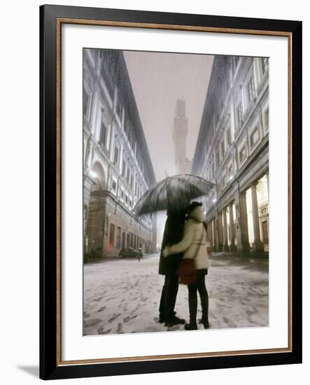 Couple Kiss Each Other During a Snowfall in Florence, Italy-null-Framed Photographic Print