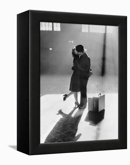 Couple Kissing in Train Station-null-Framed Premier Image Canvas