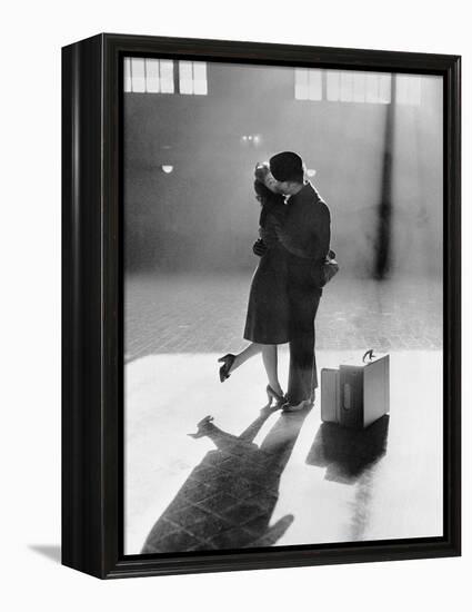 Couple Kissing in Train Station-null-Framed Premier Image Canvas