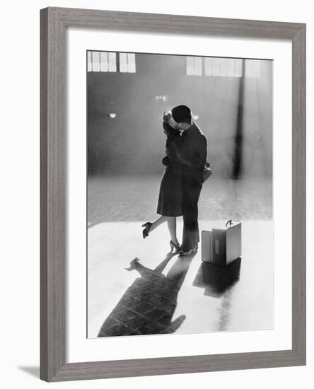 Couple Kissing in Train Station-null-Framed Photographic Print