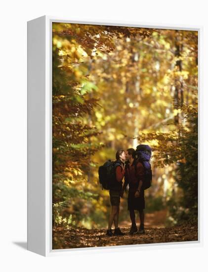 Couple Kissing on the Trail During a Hike-null-Framed Premier Image Canvas