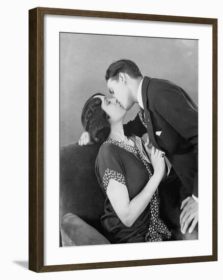 Couple Kissing Passionately-null-Framed Photo