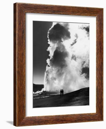 Couple Looking at Geyser Old Faithful at Yellowstone National Park-Alfred Eisenstaedt-Framed Photographic Print