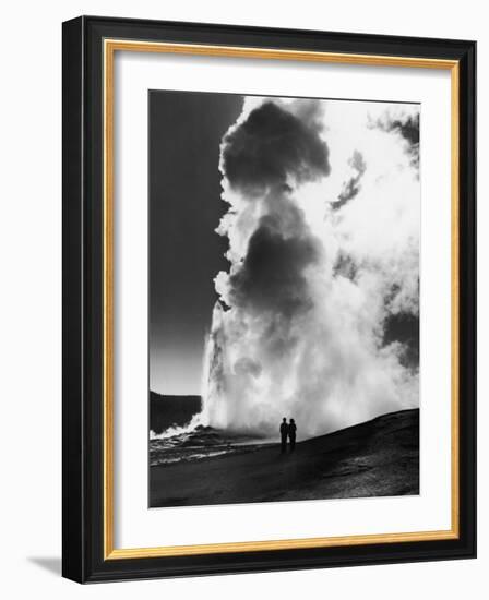 Couple Looking at Geyser Old Faithful at Yellowstone National Park-Alfred Eisenstaedt-Framed Photographic Print