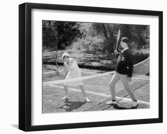 Couple Playing Tennis Together-null-Framed Photo