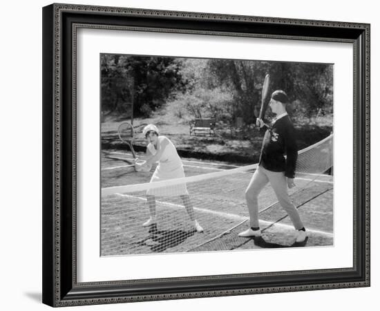 Couple Playing Tennis Together-null-Framed Photo