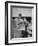 Couple Reading Newspaper Account of the Death of Evita Peron at 33 from Cancer-Alfred Eisenstaedt-Framed Photographic Print