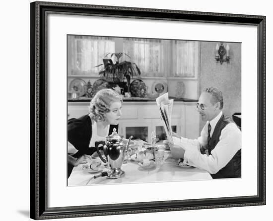 Couple Reading Newspaper at Breakfast Table-null-Framed Photo