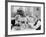 Couple Reading Newspaper at Breakfast Table-null-Framed Photo