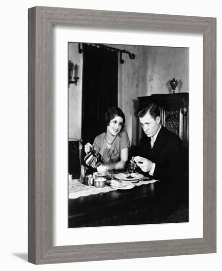 Couple Sitting Together Having Tea-null-Framed Photo